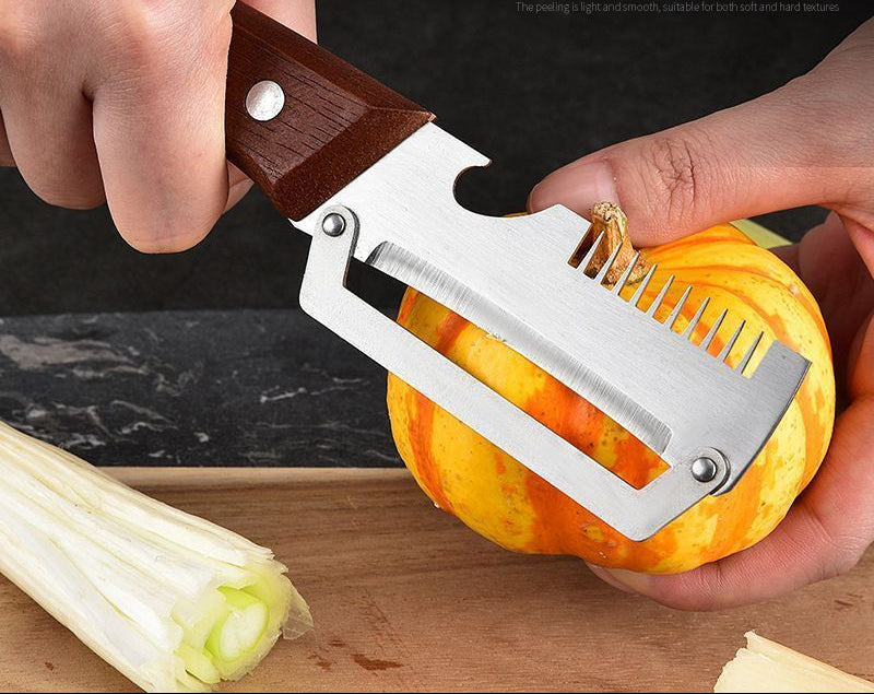 MULTIFUNCTIONAL  Ultra Sharp Vegetable Peeler & Cutter